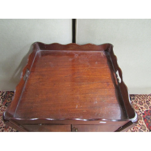 2673 - A Georgian mahogany tray top commode, the front elevation enclosed by the original pull out base, en... 