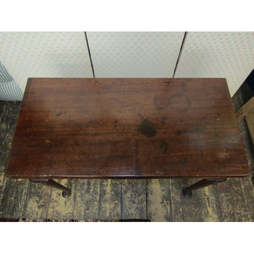 2681 - A Georgian mahogany foldover top tea table with concertina action, raised on four pad feet