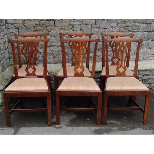 2692 - A set of six 19th century dining chairs with carved and pierced splats, shaped cresting rails and dr... 