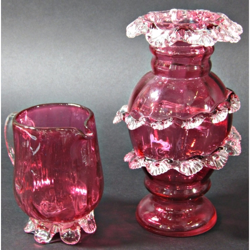 1136 - A mixed selection of glassware including two matching pink Alum glass jug and vase, a glass horse he... 