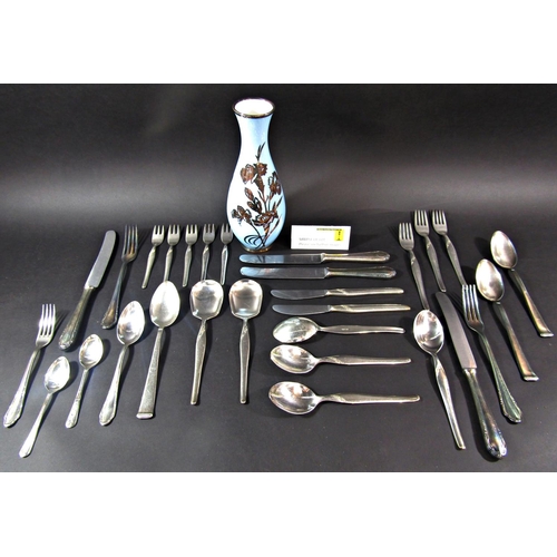 1191 - A quantity of loose cutlery, most matching and a pale blue West German glass floral decorated vase.