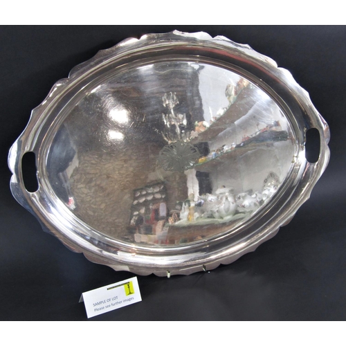 1194 - A large Walker & Hall silver plated oval tray with engraved central medallion 60cm x 46cm, and a hal... 