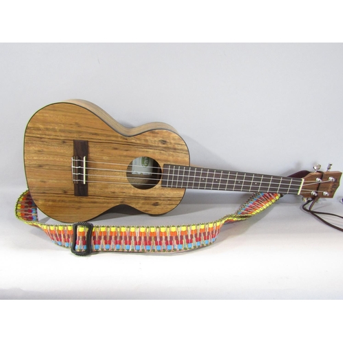 1575 - A walnut Kala ukelele model number KA-PWT virtually unused, with travelling case