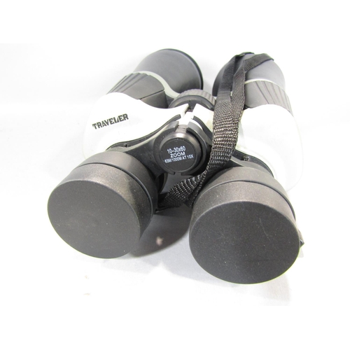 1585 - An Optomax autom 1.55 telescopic lens, pair of lightweight traveller 3 x 60 zoom lens binocular, thr... 