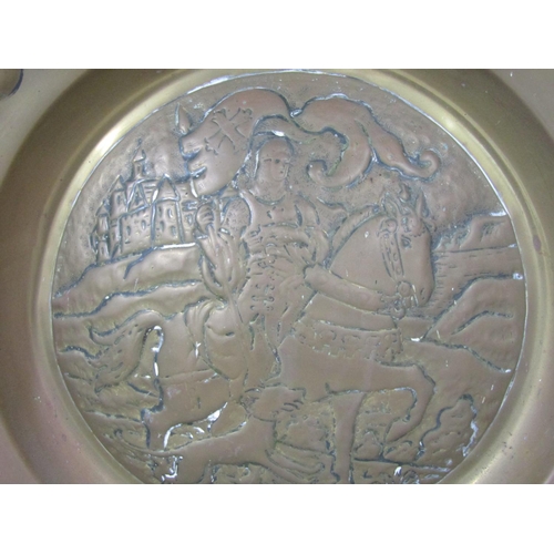 1594 - A 19th century brass alms dish in an earlier style showing crusader and hound, brass column table la... 