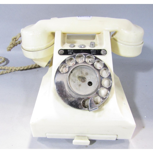 1599 - A vintage GPO 314L white Bakelite telephone with chrome fittings and bell selector, together with a ... 