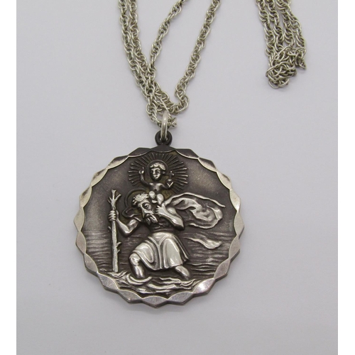 1365 - Large reversible silver St Christopher pendant by Georg Jensen, London 1974, hung on a long silver c... 