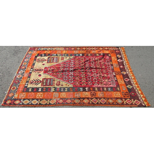 1705 - A North African Kilim Prayer Mat with three concentric geometric borders, 210cm x 140cm approx.