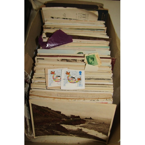 311 - A box of miscellaneous stamps, many from torn envelopes, mainly mid-20th century and later, a quanti... 