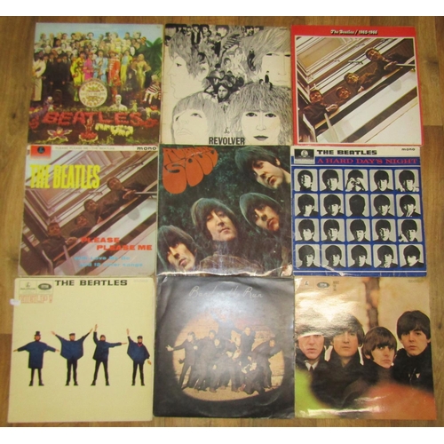 322 - A collection of Beatles LPs to include Help, Beatles for Sale, Hard Days Night, Rubber Soul, Please ... 