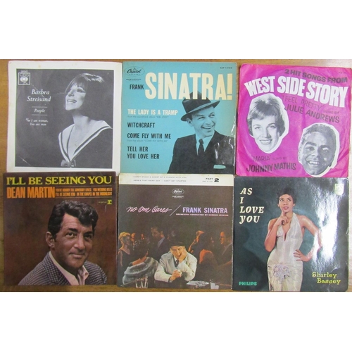 326 - A collection of 45rpm vinyl to include Barbara Streisand, Nat King Cole, Dean Martin, Eartha Kit, Th... 