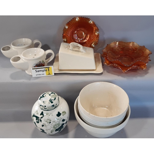 1122 - A large quantity of miscellaneous china, carnival glass, mixing bowls, etc, together with a collecti... 