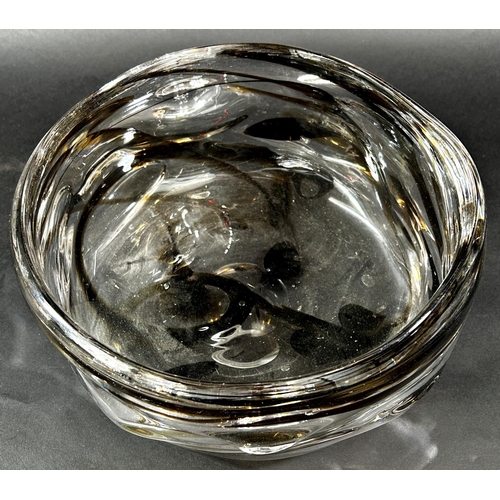 1151 - A late 20th century glass fruit bowl with a black wavy design, 23cm diam.