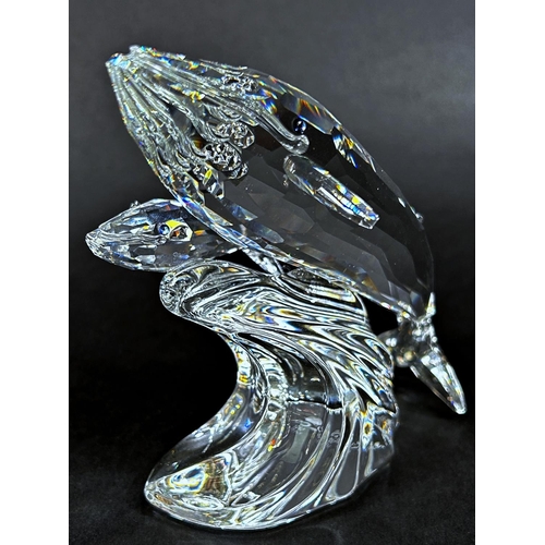 1152 - A Swarovski Collectors Society glass blue whale with calf, 10cm high approx, with it’s original box.