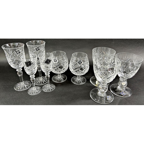 1135 - Four Royal Brierley Silver Jubilee cut glass wine glasses with a coin inside the stem, and three Edi... 