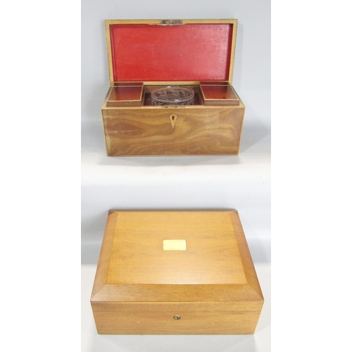 1602 - A Georgian mahogany tea caddy, the interior fitted with two compartments and original etched glass b... 