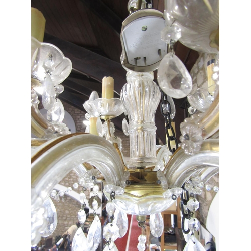 1607A - A cut glass 12 branch chandelier with festoon drops and a further 8 branch example 92)