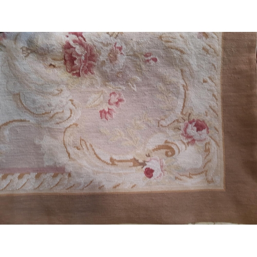 1706 - An early 20th century Aubusson style Tapestry wall hanging with clusters of flowers to centre and co... 