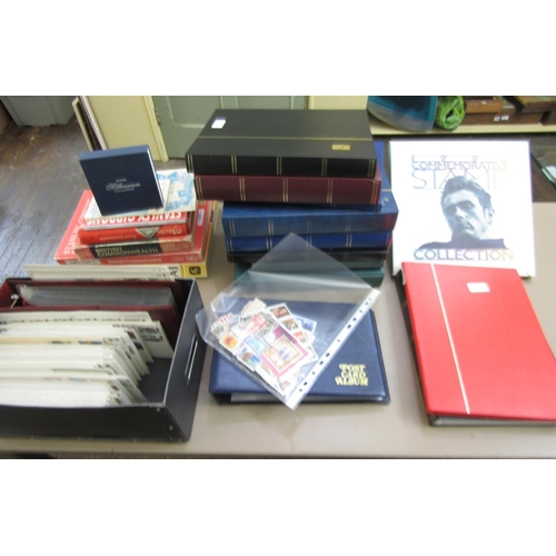 310 - A large quantity of stamps to include FDCs 1951-69, 1971-90, an album containing mint stamps 1951-84... 