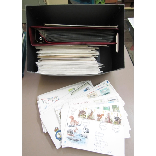 310 - A large quantity of stamps to include FDCs 1951-69, 1971-90, an album containing mint stamps 1951-84... 