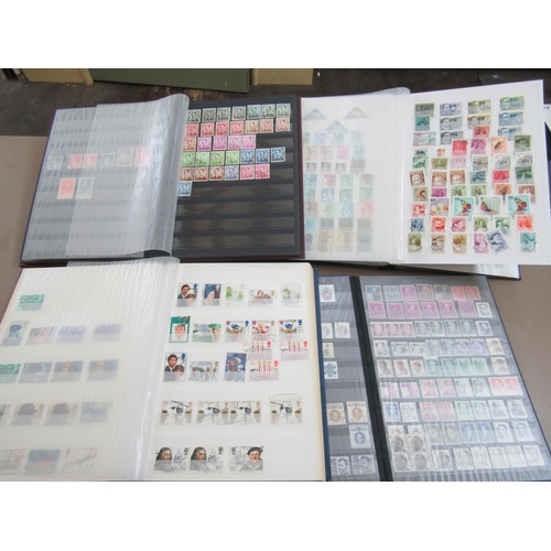 310 - A large quantity of stamps to include FDCs 1951-69, 1971-90, an album containing mint stamps 1951-84... 