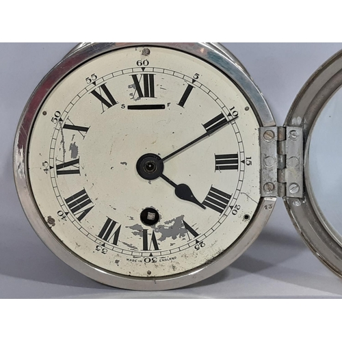 1405 - A marine or bulk head clock in a plated case work with eight day time piece