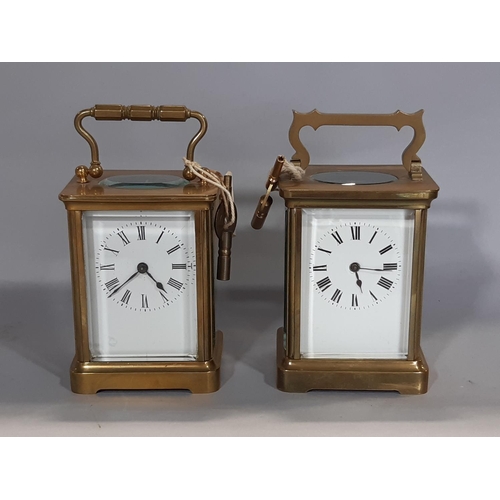 1407 - Two french carriage clocks with 8 day movement, enamelled dials each with a key