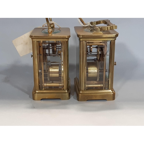 1407 - Two french carriage clocks with 8 day movement, enamelled dials each with a key