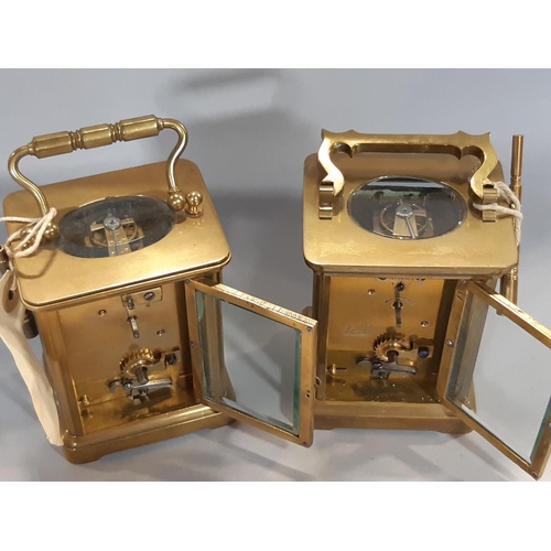 1407 - Two french carriage clocks with 8 day movement, enamelled dials each with a key