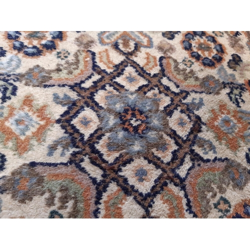 1713 - A narrow Middle Eastern runner with a repeating pattern in pale blues and brown, 330cm x 56cm approx... 