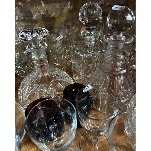 1166 - A large quantity of mixed glassware, decanters, bowls, wine glasses, vases, finger bowls, etc