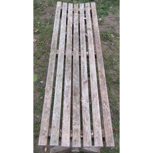 2050A - A weathered teak garden table of square cut form with slatted panelled top, 90 cm square x 75 cm hig... 