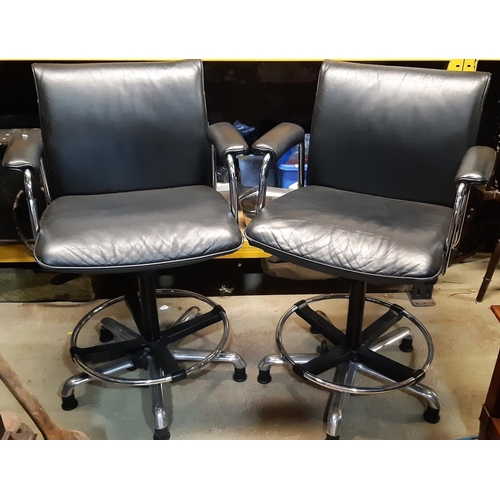 2120 - A pair of good quality swivel and height adjustable chair back stools with chrome and cast alloy fra... 