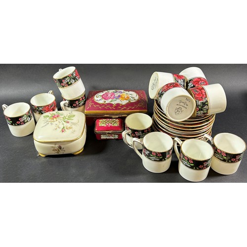 1128 - Eleven tudor Rose pattern coffee cans and saucers, two Limoges porcelain boxes and three leaf plates