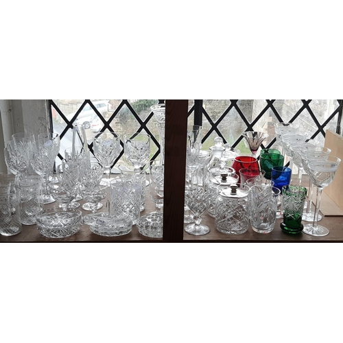 1150 - A mixed selection of fine cut glassware, with slender wine glasses with faceted stems and other glas... 