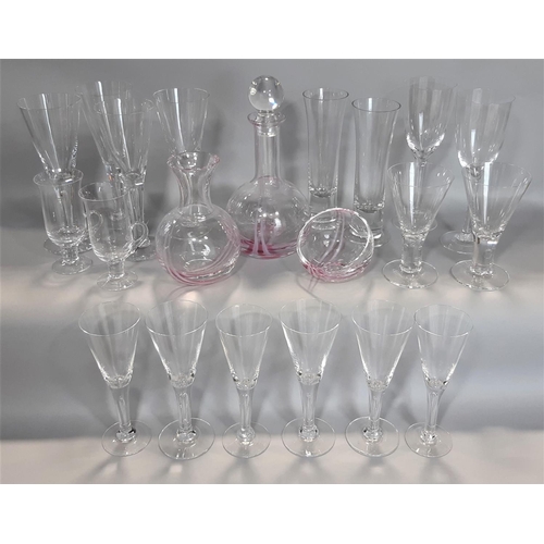 1130 - A Caithness pink decanter, carafe, bowl and a suite of 18 Dartington glasses comprising 12 flutes , ... 