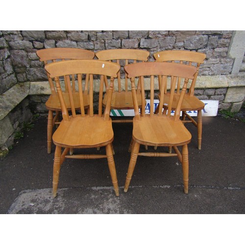 2121 - A set of five modern Windsor lathe back kitchen chairs  in light beechwood (af)