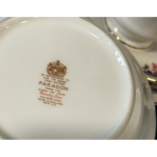 1015 - A collection of Paragon china tea wares comprising six tea cups, saucers and tea plates, cake plates... 