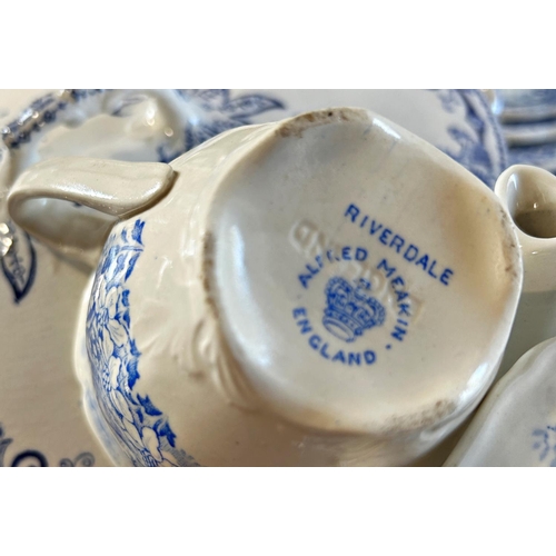 1034 - A large collection of blue and white china wares comprising Alfred Meakin Riverdale pattern teapot, ... 