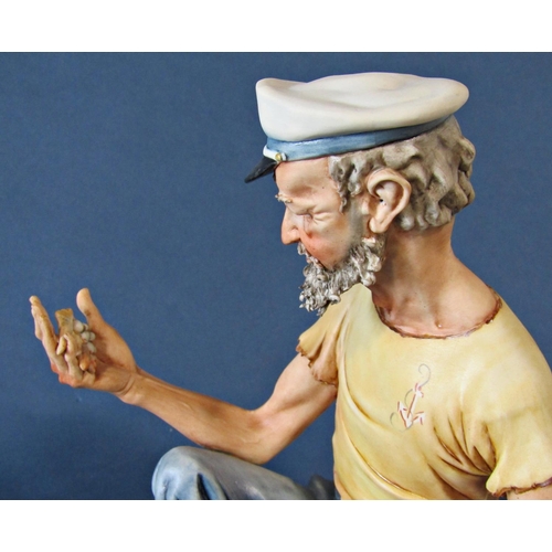 1059 - A Capodimonte figure of a sailor