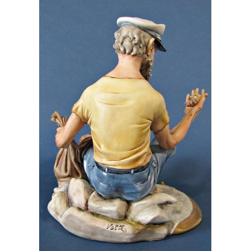 1059 - A Capodimonte figure of a sailor