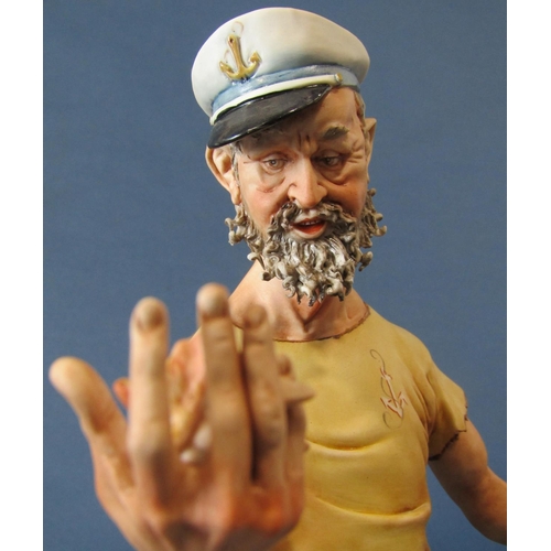 1059 - A Capodimonte figure of a sailor