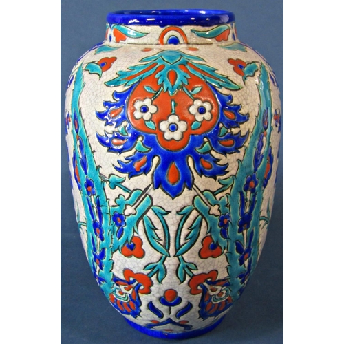 1062 - An Art Deco Vase by Laroche Belge, decorated in relief with green, blue, orange and turquoise scroll... 