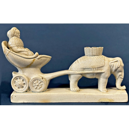 1106 - An early salt glazed figure of an elephant pulling a carriage with female occupant to the base a pap... 