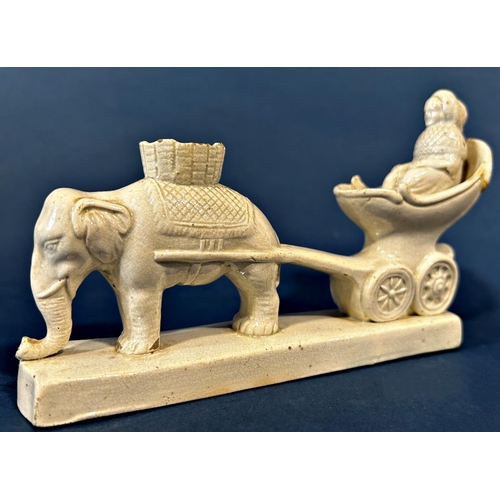 1106 - An early salt glazed figure of an elephant pulling a carriage with female occupant to the base a pap... 