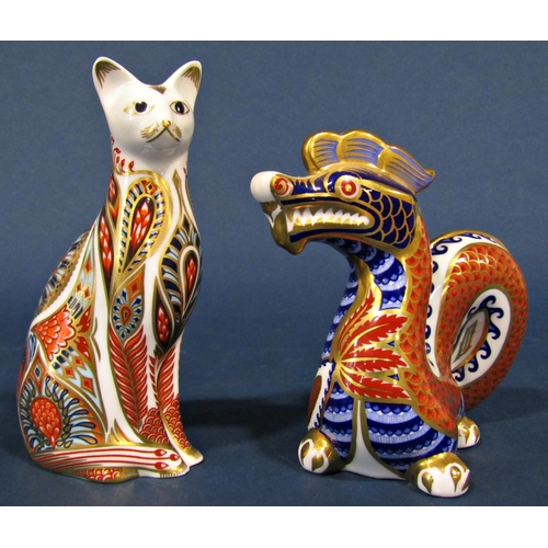 1088 - A collection of Royal Crown Derby cat figures and dragon with button stoppers to base (one button mi... 