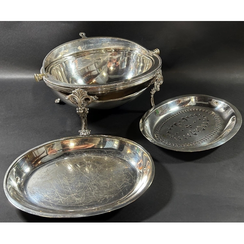 1203 - A Victorian silver plated roll top Bain Marie tureen complete with drainer raised on four scrolled s... 