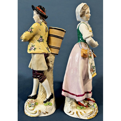 1081 - Two German Sitzendorf porcelain figurines, one a lady fish seller, the other a man carrying basket