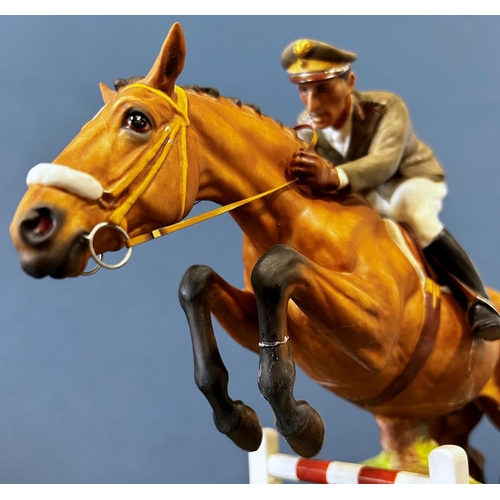 1084 - A Royal Worcester figure of General Raimondo D'Inezo, on horseback jumping a hurdle (af)