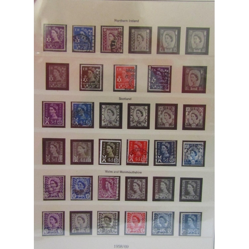 302 - An album of QEII stamps from early definitives 1960 to commemoratives 1969, additional pages for Isl... 